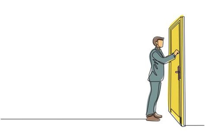 How does a deaf person know someone is at the door?