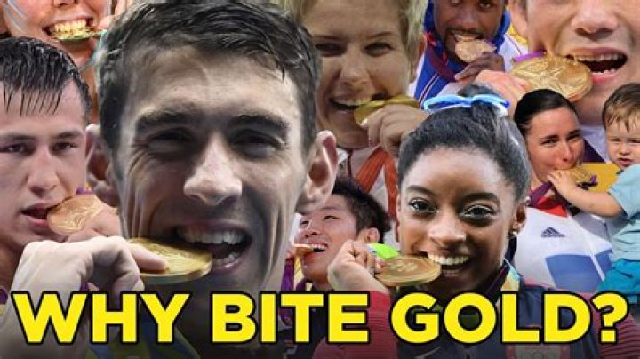 Why do they bite the gold medal?