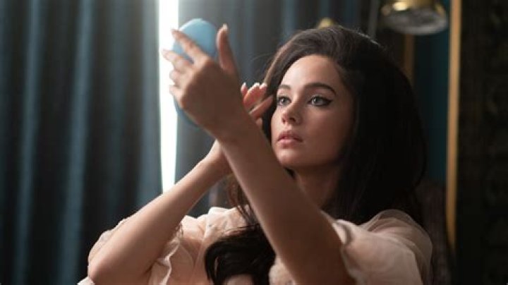 Why does Bella dye her hair?